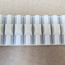Pasek zębaty z klinem prowadzącym w osi paska zębatego 